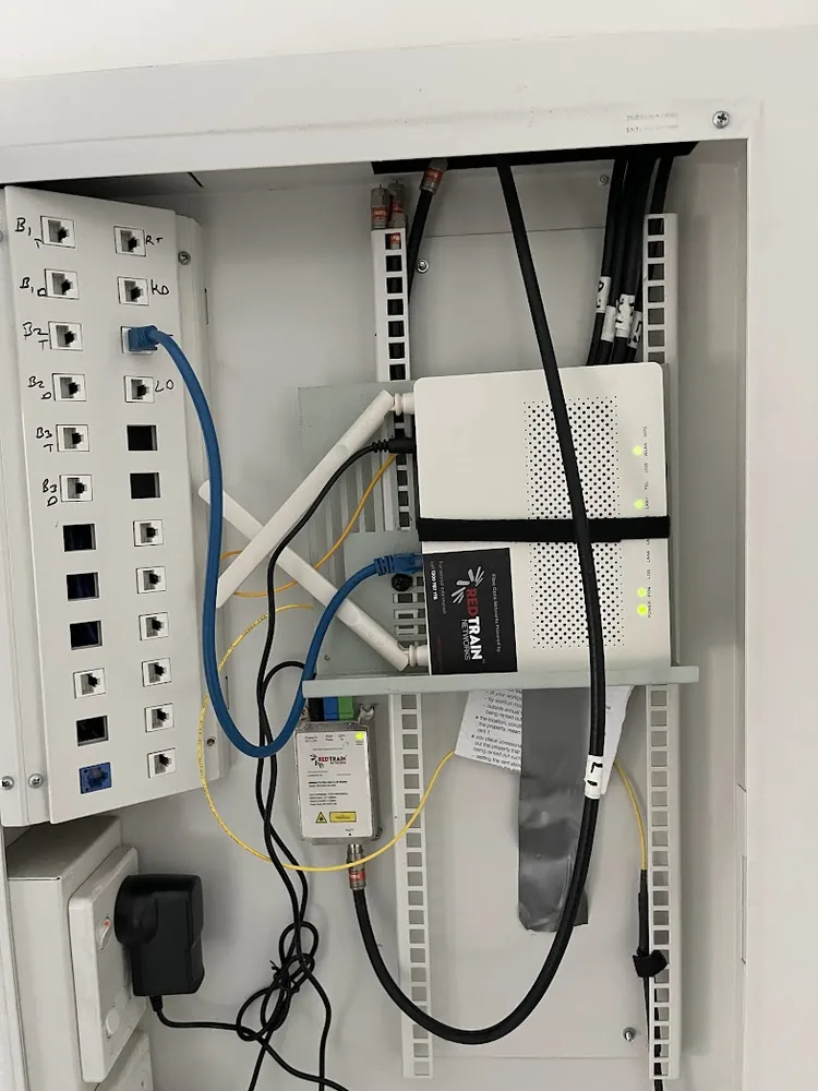 Huawei ONT and patch cabling inside a communications enclosure